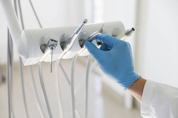 Professional Emergency Dentist technician working in Warrensburg, IL